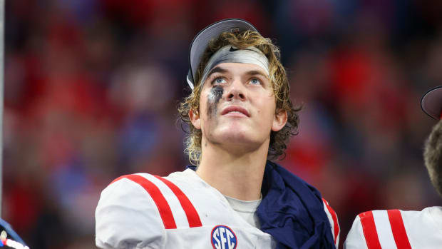 Ole Miss quarterback Jaxson Dart looks towards the sky.